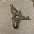 A handsome, decorator-grade complete set of five (5) vintage-style solid brass architectural wall hooks. Featuring a...