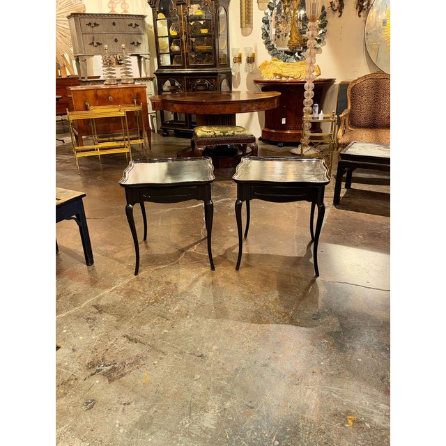 This pair of vintage French black oak side tables is a stylish addition to any room. Adds a touch of vintage charm to your...