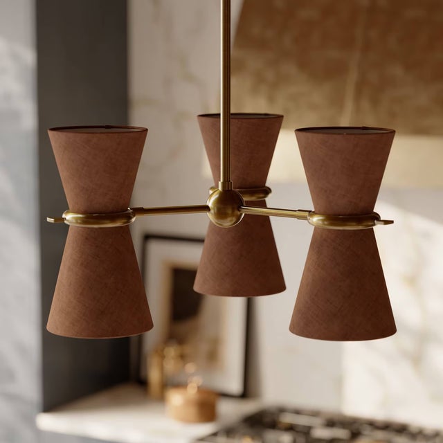 Inspired by a vintage French mid-century find, the Gable Collection celebrates antique natural brass with rich character...