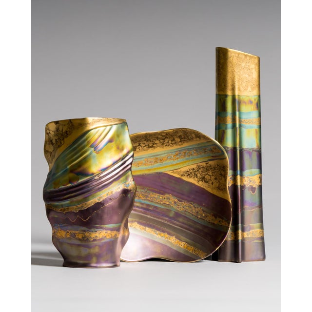 A three-piece porcelain set from rosenthal studio linie, combining dutch designer johan van loon's folded, fluid forms...