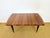 Art Deco dining table with a varnished walnut top dating from the 1940s. This elegant Art Deco table stands out for its...