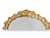 Heavy midcentury American vanity mirror with ornate gold filigree surround and elegant oval form. The richly detailed...