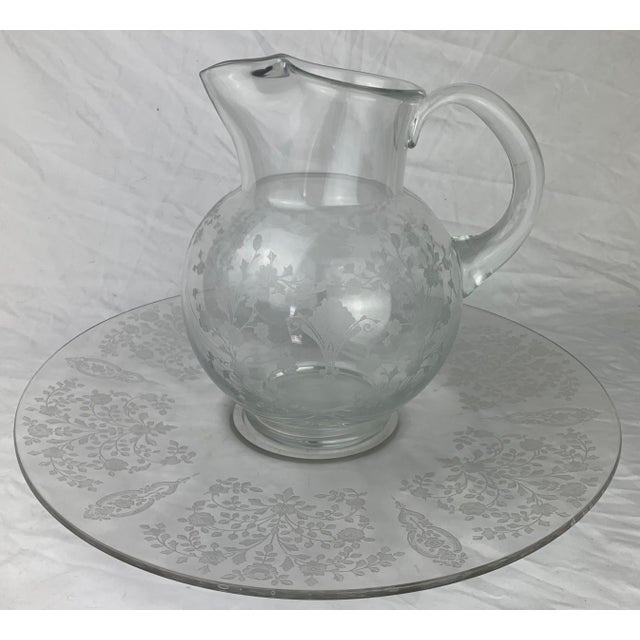 Etched Glass Pitcher With Matching Glass Round Tray. Pitcher is 7" Dia x 9"H