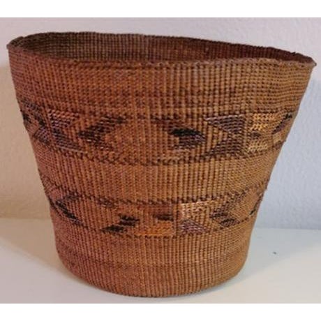 This is a lovely old (at least vintage) Tlingit basket. The Tlingit are recognized for their weaving skills which is shown...