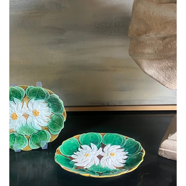 Set of two Holdcroft Majolica dishes with lily pads and flowers, made in England around the 1880's.