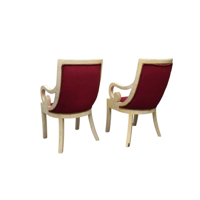 This product is a pair of Tessellated Bone Scrolling Armchairs from the Mid-Century Modern era. These antique chairs are...