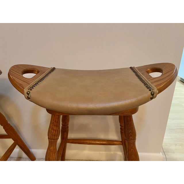 Mastercraft Vintage Swivel Wooden Saddle Stools 27” - A Pair For Sale - Image 4 of 6