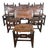 Set of Six Spanish Revival Leather and Carved Wood Armchairs For Sale