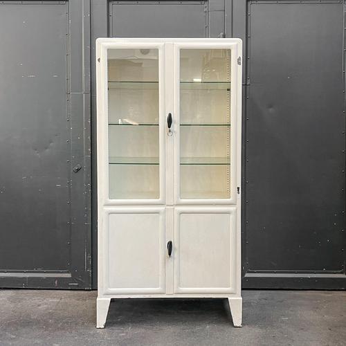 Metal cabinet · display cabinet style. Industrial · mid-century · 1950s–1960s material. Metal · cream-white lacquered ·...