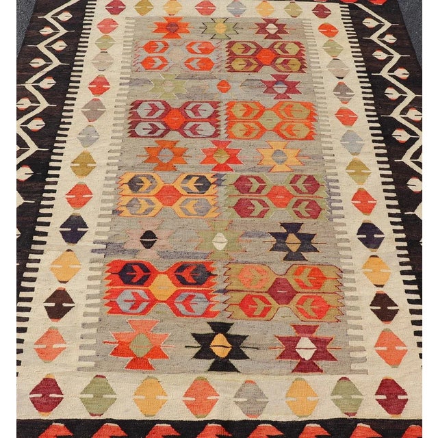 Mid 20th Century Mid 20th Century Colorful Vintage Turkish Flatweave Rug With All-Over Tribal Design For Sale - Image 5 of 12