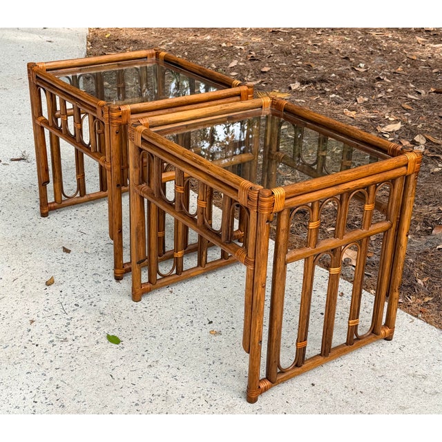 Attractive pair of bamboo rattan side tables measuring 24" wide, 21" deep and 23" high. In excellent vintage condition.