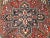 Vintage Heriz Area Rug, Handwoven Geometric Pattern, Red & Navy, 5’ X 7’ For Sale - Image 9 of 11