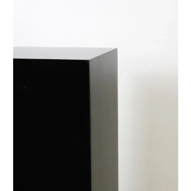 Design column, rectangular, in black lacquered wood. Period: Contemporary Dimensions: 30 x 30 x H120 cm