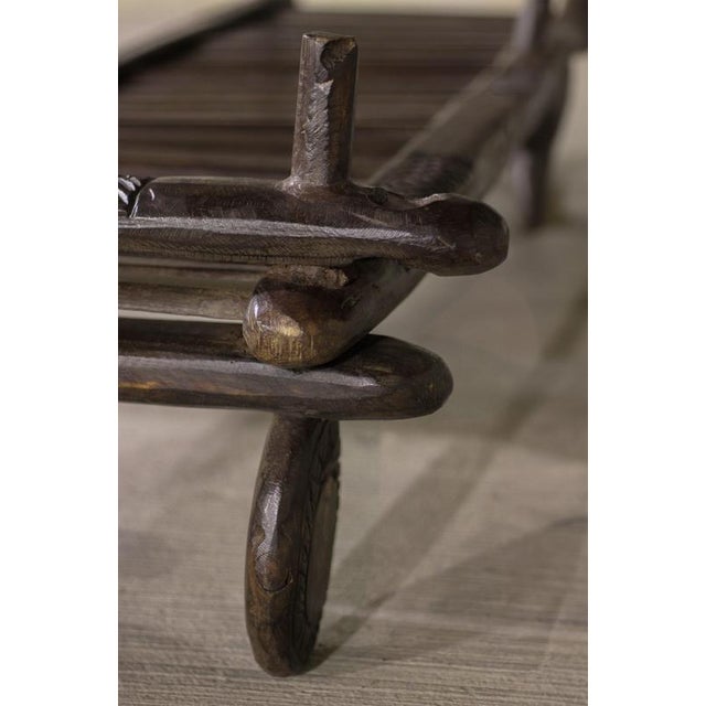 This exquisite piece is a true masterpiece of creative carpentry, handcrafted by the Pygmy people from the lush jungles...