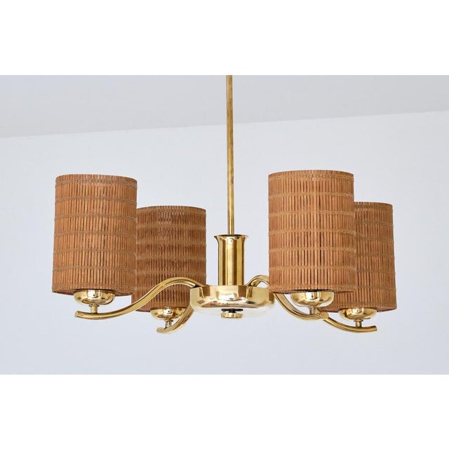 This rare four-arm chandelier was designed by Paavo Tynell in the early 1930s. It was produced by Taito Oy in Finland and...