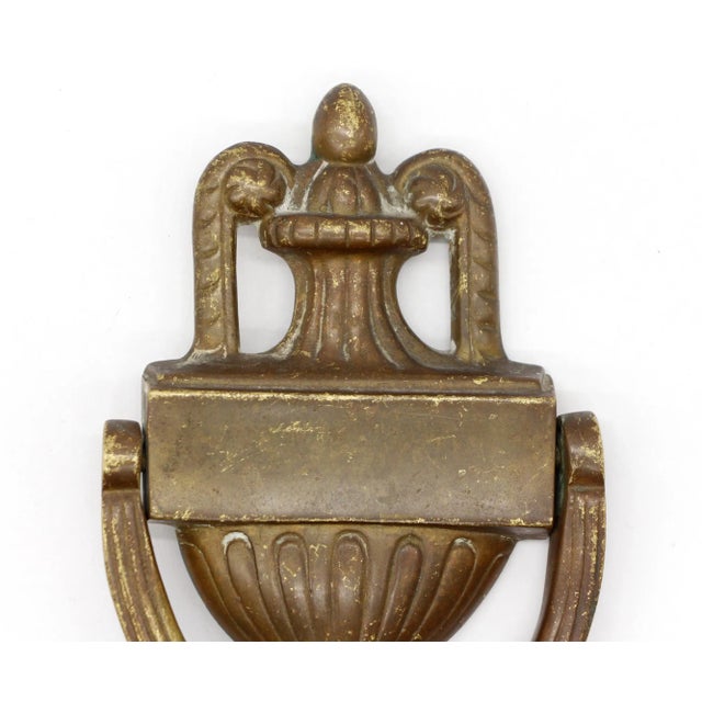 Vintage solid cast bronze Traditional door knocker with a B on the handle and a dark patina from age. One available. The...