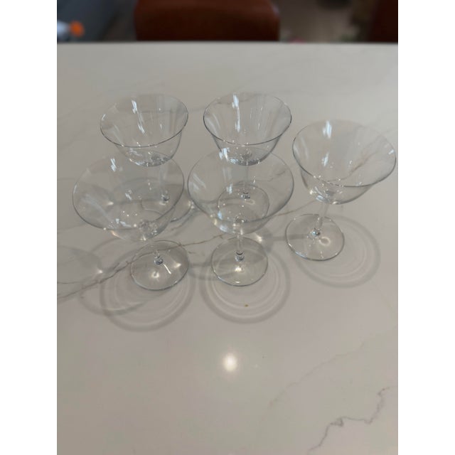 A rare find for the minimalist collector: a set of four (plus one bonus) Baccarat Perfection port wine glasses. Designed...
