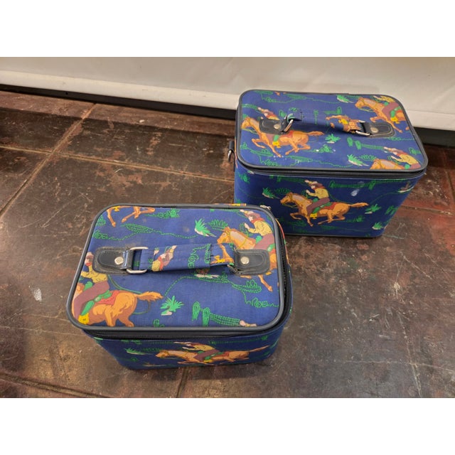 A well-made 1960s Western Art suitcase set.