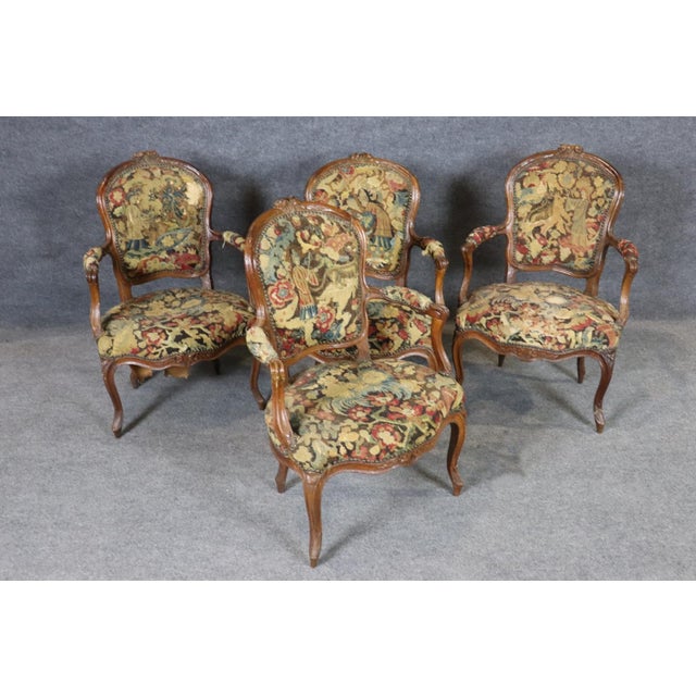 This exquisite set of four French Louis XV salon armchairs embodies the elegance, artistry, and romantic refinement that...