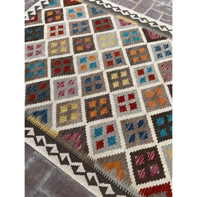 Handwoven Bohemian Kilim Rug, Multi-Color Geometric Design, 4.9' X 6.5' For Sale - Image 4 of 9