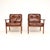A beautifully designed pair of vintage Scandinavian leather armchairs by Frederik Kayser. They were made in Norway by...