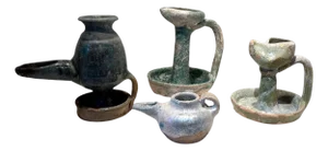 Collection of Four Persian Glazed Ceramic Oil Lamps