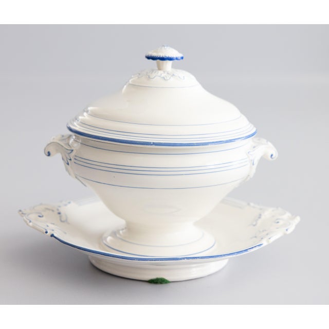 A beautiful antique French blue and white porcelain lidded sauce tureen with attached underplate. Hallmark on reverse....