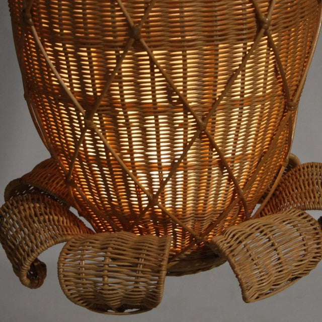 Incredible large rattan "pineapple" pendant light with two lights. One at the top and one in the body of the pineapple....