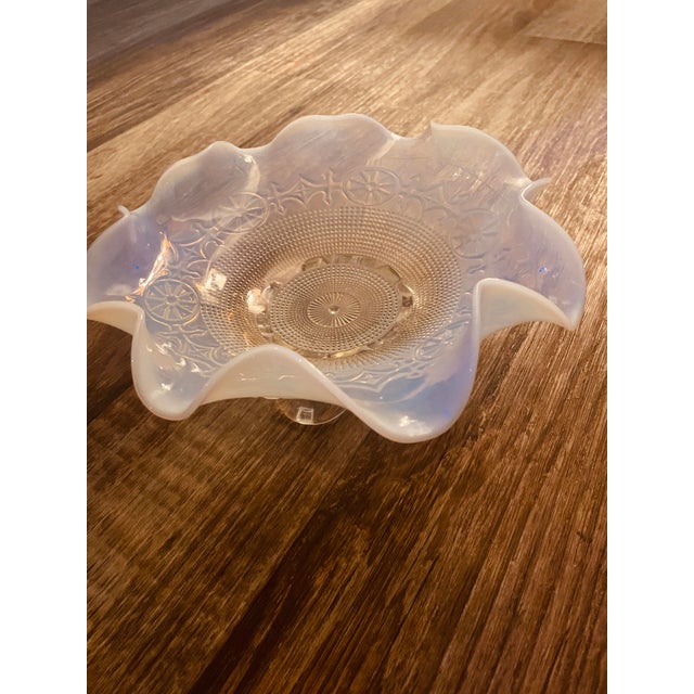 What a stunning piece of art that can also be functional, while catching the eye and hopefully the light in whatever room...