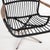Stunning blackened rattan armchair with chrome legs. Exquisite with its rare combination of these two materials, it...