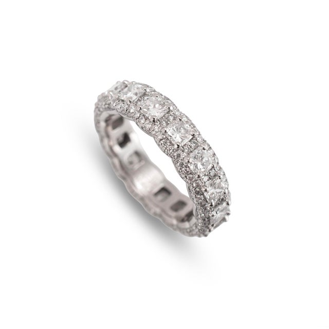 Gender: Ladies Metal Type: Platinum Ring Size: 7.5 Width: 5.69 mm Weight: 10.22 grams Ladies platinum comfort-fit, diamond...