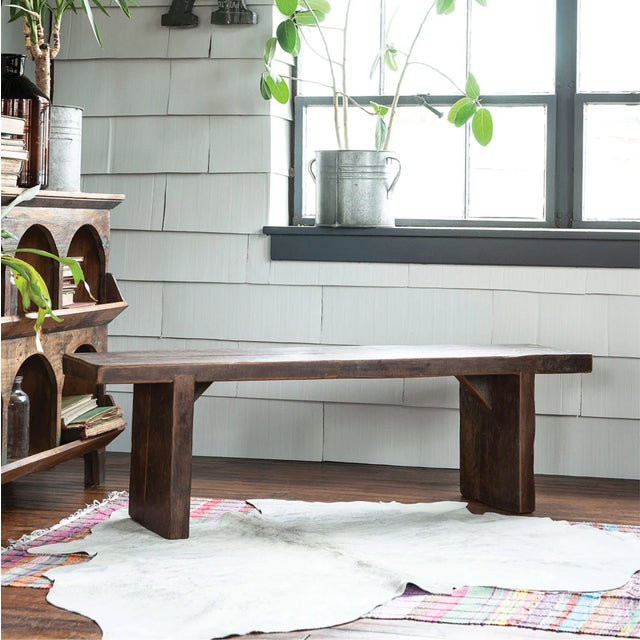 Strong and enduring, the Timbers Slab Bench is hand-crafted from reclaimed wood. Place in an entry or as bench seating at...