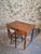 French oak desk table dating from the 1920s, featuring a simple and functional design with turned legs and two drawers....