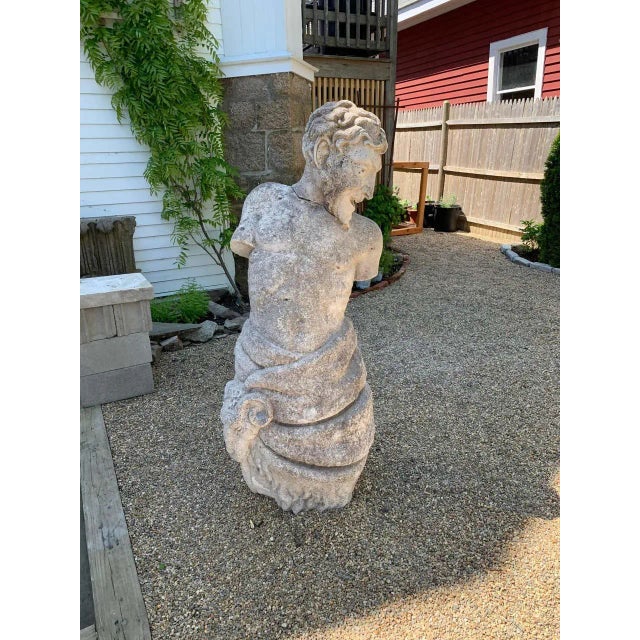 A Period German or French large scale Baroque Garden Statue of a Pan Satyr. Well carved with impish gaze and wrapped in...