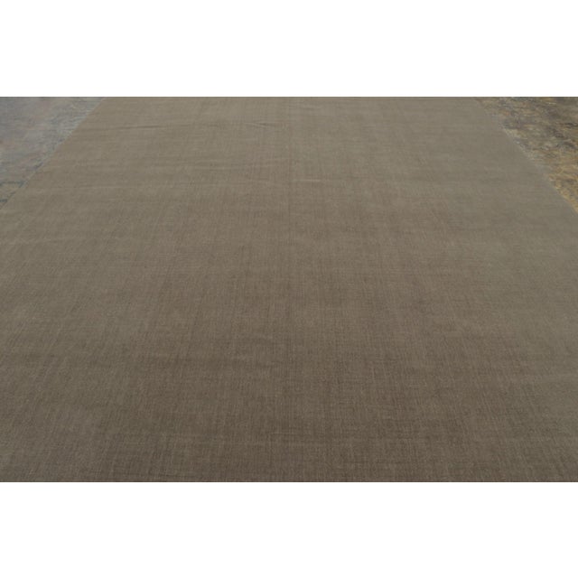 Hand-knotted in wool, this monumental 11x16 rug is a sophisticated addition to Rug & Kilim’s Textural collection. Defined...