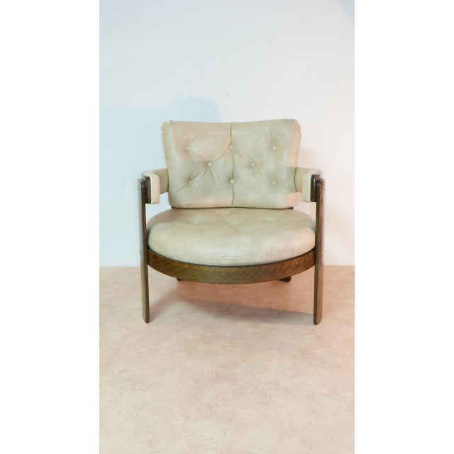 Set of two pieces, round easy-chair with fitting round glass-table, very nice condition! Table is 72cm diameter and 47cm...