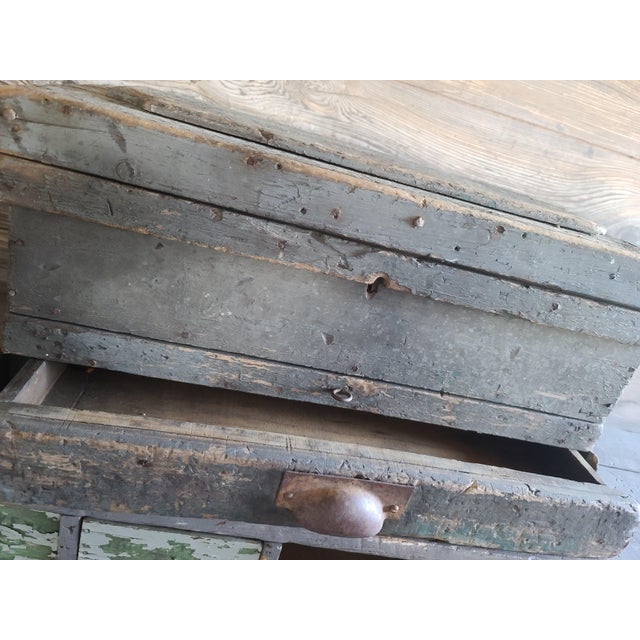 Early American document box as found. Lid opens to one concealment space. Below that is one shallow drawer and still below...