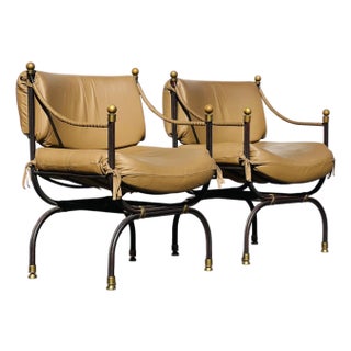 Pair of Curule Leather and Brass Campaign Armchairs Styled After Steve Chase For Sale