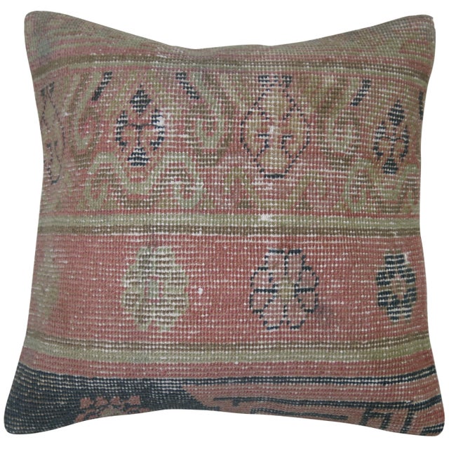 Pillow made from a 19th century antique Khotan rug with cotton back. Zipper closure included. 15'' x 16''