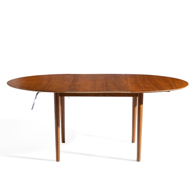 Moreddi Style Mid Century Danish Teak Expanding Dining Table with 1 Leaf This table measures: 49 wide x 45.5 deep x 29...