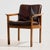 The oak armchair was designed by Laszlo Mazák for Wiesner-Hager in the 1970s. The chair is upholstered with real leather...