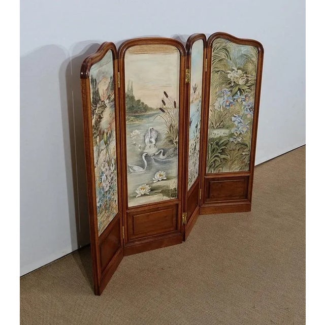 Charming small Art Nouveau style screen with a solid walnut moulded frame. Each of the four leaves has a small rectangular...