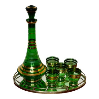 Vintage Mid-Century Decanter Set With Stopper and 5 Glasses Green Glass With Gold Gilt Bands Design For Sale