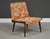 A mid century modern walnut lounge chair with orange and white fabric made by Kroehler Furniture. Fabric in good overall...