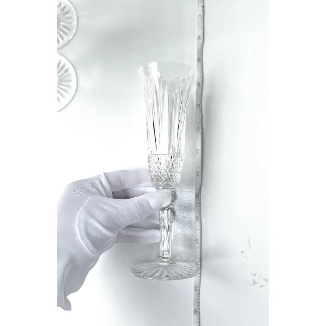 Set of 6 vintage cut Saint Louis ‘Tommy’ champagne flutes Intricate diamond- cut lower bowl with vertical fluting above...