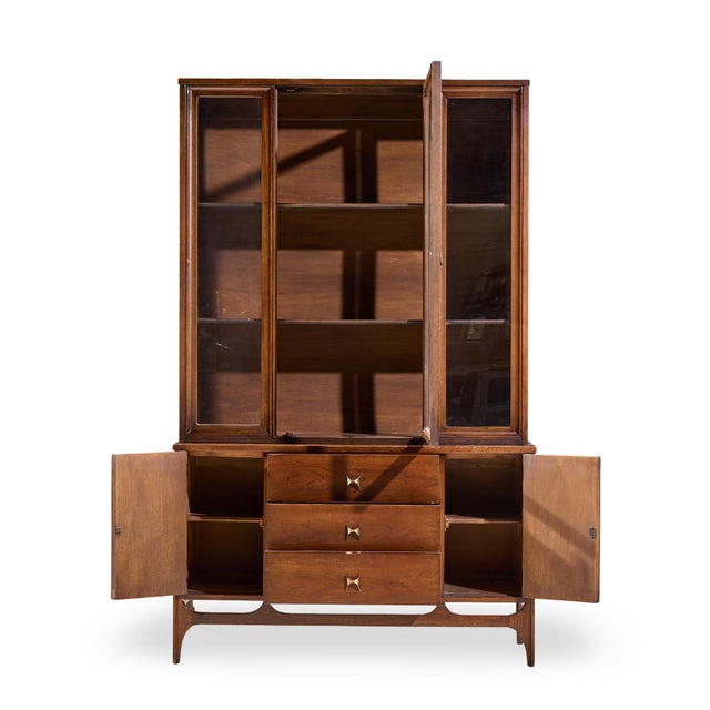 Broyhill Brasilia Mid Century Walnut China Cabinet The lower of the china cabinet measures: 46 wide x 17 deep x 28 inches...
