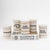 Charming antique-inspired ceramic apothecary jars featuring elegant off-white glazing with delicate gold detailing and...