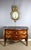 Jumping chest of drawers, curved on all sides, with two drawers without crosspiece in floral marquetry. The top is made of...