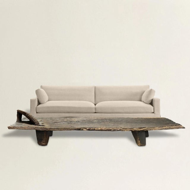 A stunning and rare early 20th century Senufo ceremonial bed, hand-carved from one piece of wood, with the most wonderful...