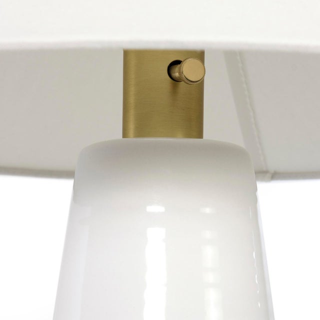 The Koda Ceramic Table Lamp is accented with horizontal throwing lines that add handcrafted texture and depth. Topped with...